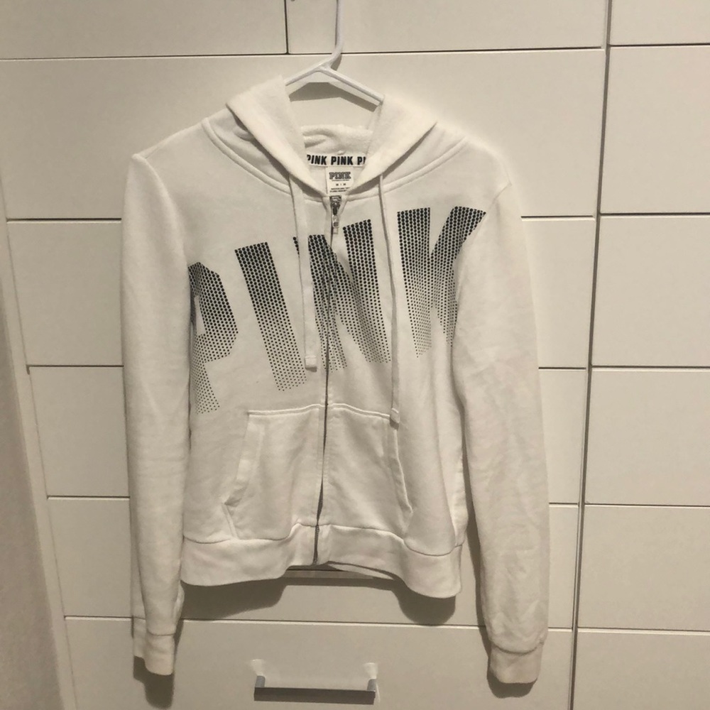 white zip up jacket